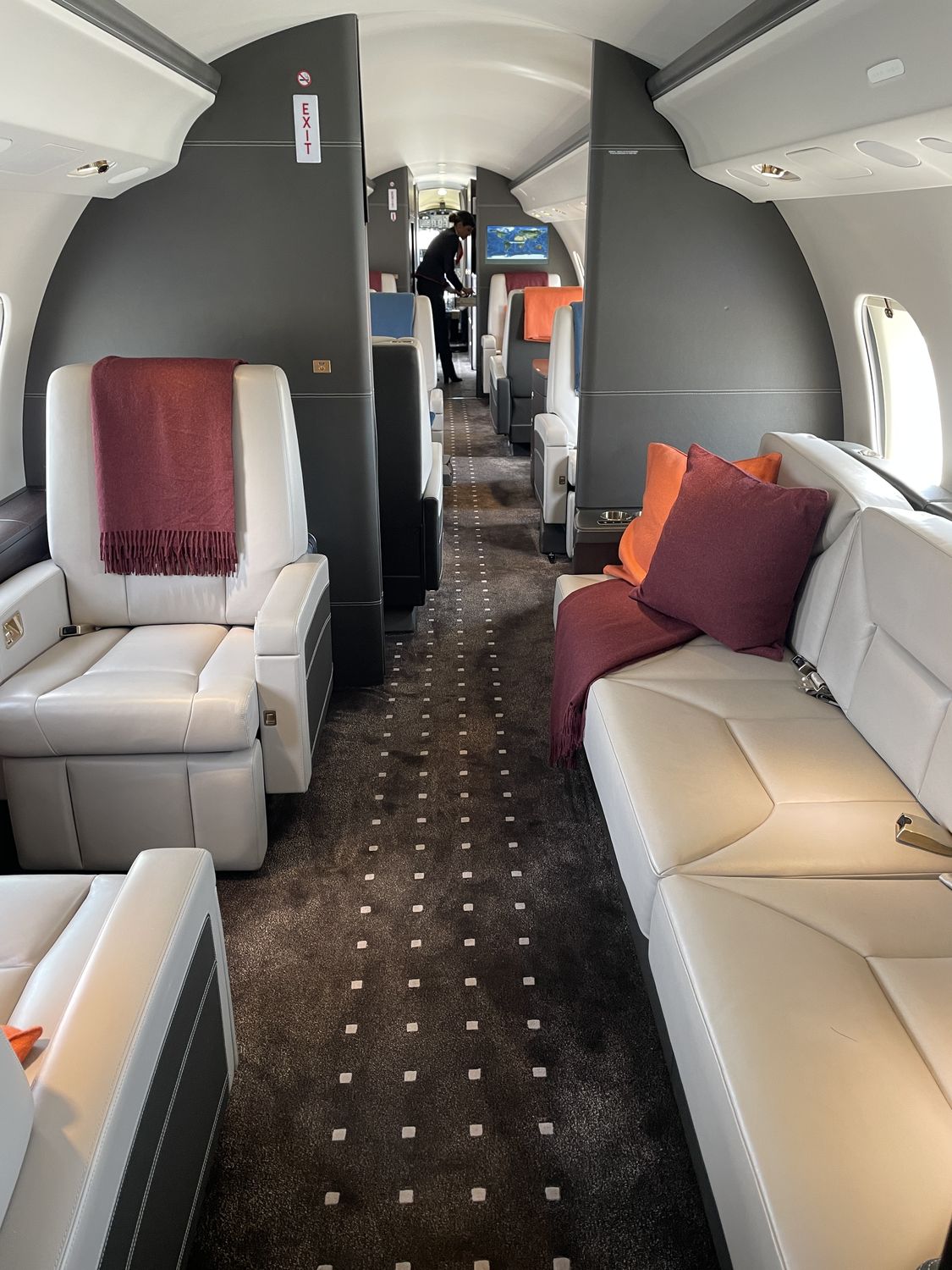 Private jet cabin interior with leather seating